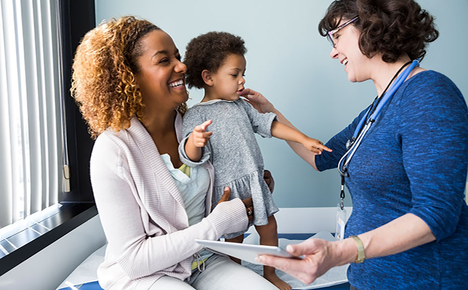 mom and toddler with doctor